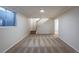 Finished basement featuring neutral walls, plush carpeting, staircase, and ample space to relax at 1266 S Telluride St, Aurora, CO 80017