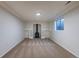 Finished basement featuring neutral walls, plush carpeting, a charming fireplace, and ample space to relax at 1266 S Telluride St, Aurora, CO 80017