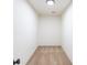 Walk-in closet with neutral carpeting providing a tidy and organized storage solution at 1266 S Telluride St, Aurora, CO 80017