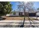 A charming single-Gathering home showcasing its welcoming front exterior and manicured lawn at 1266 S Telluride St, Aurora, CO 80017