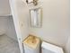 Bathroom featuring a vanity with a framed mirror and a toilet at 1391 Vance St, Lakewood, CO 80214