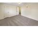 An empty bedroom with neutral carpet and white walls, providing a blank canvas for personalization at 1391 Vance St, Lakewood, CO 80214