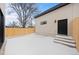 A fenced backyard of a home with a modern exterior at 2520 S Cherokee St, Denver, CO 80223