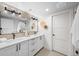 Bathroom with double sink vanity and modern fixtures, with great lighting and plenty of room at 2520 S Cherokee St, Denver, CO 80223