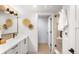 Bathroom featuring modern vanity, stylish fixtures, and walk-in shower at 2520 S Cherokee St, Denver, CO 80223
