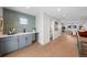 Hallway features a wet bar leading to the living room at 2520 S Cherokee St, Denver, CO 80223