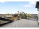 Large patio area features metal guardrails and beautiful views of the surrounding neighborhood at 2520 S Cherokee St, Denver, CO 80223