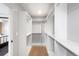 Spacious walk-in closet with custom shelving and ample storage space at 2520 S Cherokee St, Denver, CO 80223