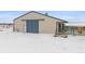 Barn with stalls and a covered seating area at 7295 Sunset Ave, Elizabeth, CO 80107