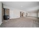 Spacious basement with stone fireplace and carpet at 7295 Sunset Ave, Elizabeth, CO 80107