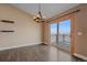 Bright dining area with hardwood floors and access to deck with scenic views at 7295 Sunset Ave, Elizabeth, CO 80107