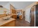 Modern kitchen with stainless steel appliances and ample wood cabinetry at 7295 Sunset Ave, Elizabeth, CO 80107