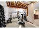 Finished basement gym with various workout equipment at 6100 E 133Rd Ave, Thornton, CO 80602