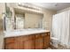 Bathroom with double sinks and shower/tub combo at 6100 E 133Rd Ave, Thornton, CO 80602