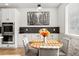 Kitchen dining area with a wooden table and four chairs at 6100 E 133Rd Ave, Thornton, CO 80602