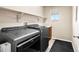 Laundry room with Whirlpool washer and dryer at 6100 E 133Rd Ave, Thornton, CO 80602