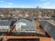 Picture of a home's backyard, showcasing its fully fenced-in yard, porch and neighborhood at 3606 S Olathe Way, Aurora, CO 80013