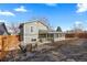 Charming home featuring a covered patio, dining furniture and well-kept fenced-in backyard at 3606 S Olathe Way, Aurora, CO 80013