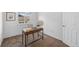 Bright bedroom featuring a desk and ample natural light from the window at 3606 S Olathe Way, Aurora, CO 80013