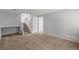 Spacious living room with a staircase and neutral-colored walls at 3606 S Olathe Way, Aurora, CO 80013