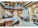 Unfinished basement with exposed beams and ductwork, offering a blank canvas for customization and storage at 17611 E 104Th Pl, Commerce City, CO 80022
