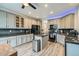 Stylish kitchen featuring stainless steel appliances, granite counters, and neutral cabinetry at 17611 E 104Th Pl, Commerce City, CO 80022