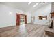 Bright and airy living room with vaulted ceilings, skylights, and wood flooring at 11254 E Colorado Dr, Aurora, CO 80012