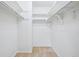 Spacious walk-in closet with multiple shelves and hanging rods at 11254 E Colorado Dr, Aurora, CO 80012