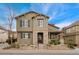 Charming two-story home with stone accents and landscaped front yard, perfect for curb appeal at 10618 Clearview Ln, Highlands Ranch, CO 80126