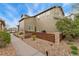 Attractive two-story home featuring stone accents, manicured landscaping, and a private outdoor patio at 10618 Clearview Ln, Highlands Ranch, CO 80126