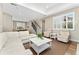 Open-concept living area with hardwood floors, plush seating, and a cozy atmosphere at 10618 Clearview Ln, Highlands Ranch, CO 80126