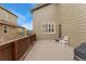 Back patio with concrete pavers, wooden fence and exterior siding at 10618 Clearview Ln, Highlands Ranch, CO 80126