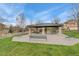 Community outdoor pavilion with stone columns, picnic tables and benches for residents to enjoy at 10618 Clearview Ln, Highlands Ranch, CO 80126