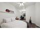 Bedroom with a queen bed and adjacent workspace at 5255 Memphis St # 207, Denver, CO 80239