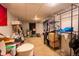 Spacious unfinished basement featuring neutral walls and carpet with shelving for storage at 10050 Holland Ct, Broomfield, CO 80021