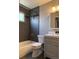 Modern bathroom featuring a tiled shower, updated fixtures, and a stylish vanity, perfect for a refreshing experience at 10050 Holland Ct, Broomfield, CO 80021