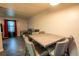 Bright dining area features an elegant marble table and gray upholstered chairs for comfortable gatherings at 10050 Holland Ct, Broomfield, CO 80021