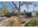 Large backyard with trampoline, shed, and patio area at 3044 Eudora St, Denver, CO 80207