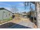 Backyard with trampoline, shed, and mature tree at 3044 Eudora St, Denver, CO 80207