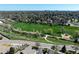 Lush green space with walking paths and recreation areas near residential properties at 6960 S Knolls Way, Centennial, CO 80122