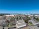 This bird's-eye view showcases the neighborhood's proximity to shopping and commercial areas at 6960 S Knolls Way, Centennial, CO 80122