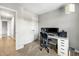 Home office features a neutral color palette, carpeted floor, and a well-lit workspace at 6960 S Knolls Way, Centennial, CO 80122