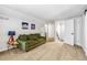 Cozy bedroom with a sitting area and multiple doorways leading to other parts of the house at 6960 S Knolls Way, Centennial, CO 80122