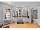 Bright bathroom with a double vanity, a large mirror and hardwood floors, creating an elegant space at 1040 N Humboldt St, Denver, CO 80218