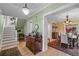 Entry foyer leading to stairs and dining room with hardwood flooring at 1040 N Humboldt St, Denver, CO 80218