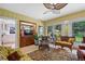 Comfortable living room with wood built-ins and backyard view through a window at 1040 N Humboldt St, Denver, CO 80218