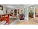 Inviting living room boasts a fireplace, built-in shelves, and doorway to hall at 1040 N Humboldt St, Denver, CO 80218