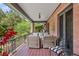 Cozy porch featuring comfortable seating, classic brick accents, and an inviting outdoor ambiance at 1040 N Humboldt St, Denver, CO 80218