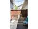 Charming backyard featuring a custom planter box, outdoor seating, and cozy ambiance at 5450 Uinta St, Denver, CO 80238