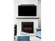 Close up view of fireplace in living room at 5450 Uinta St, Denver, CO 80238
